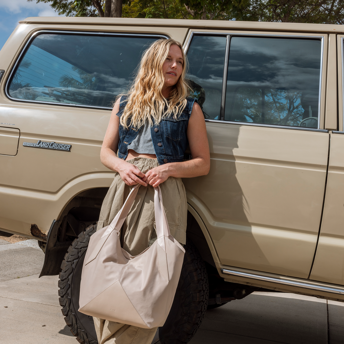 Mom Holding STATE Bags Beverly Tote in Sand