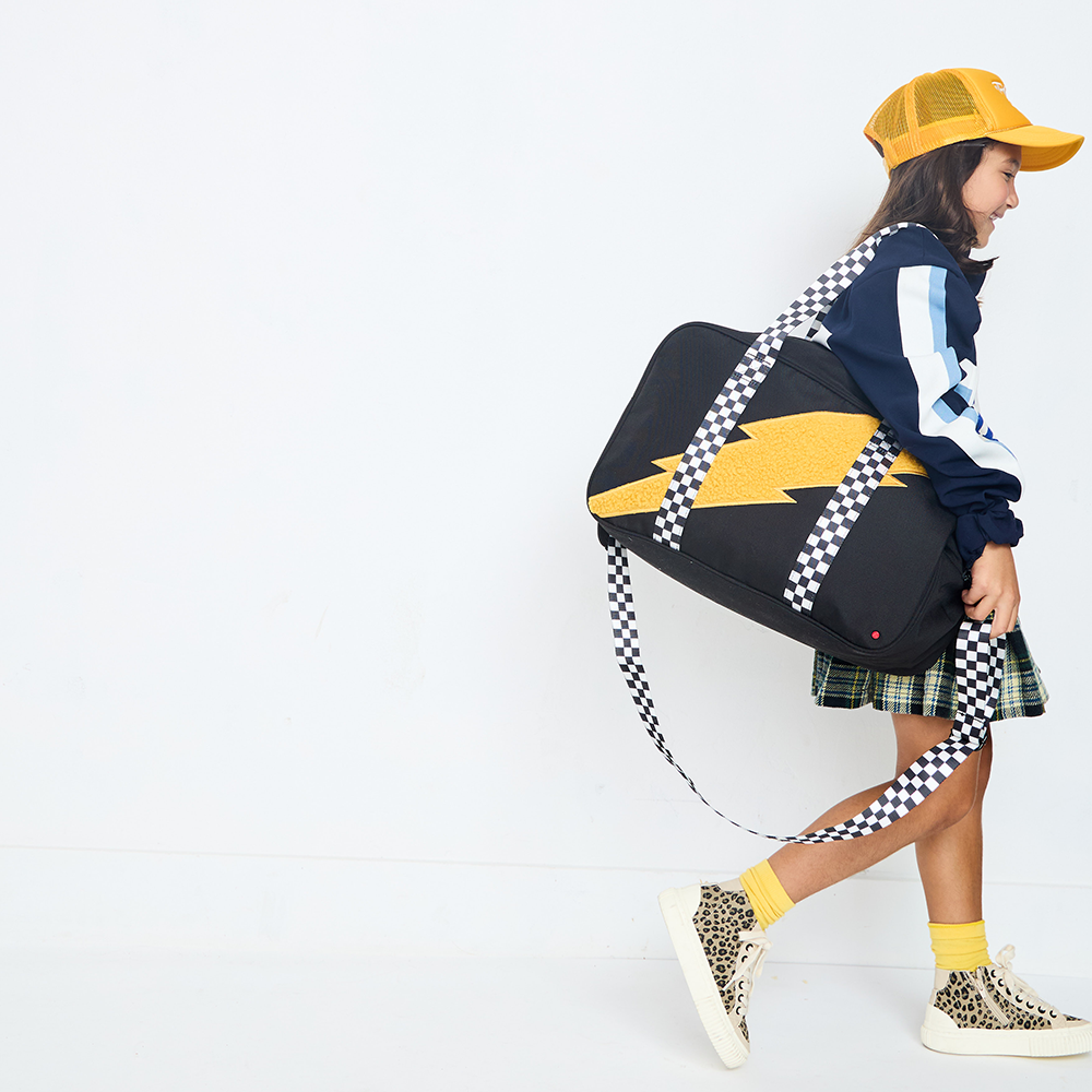 Girl wearing STATE Bags Rockaway Bolt