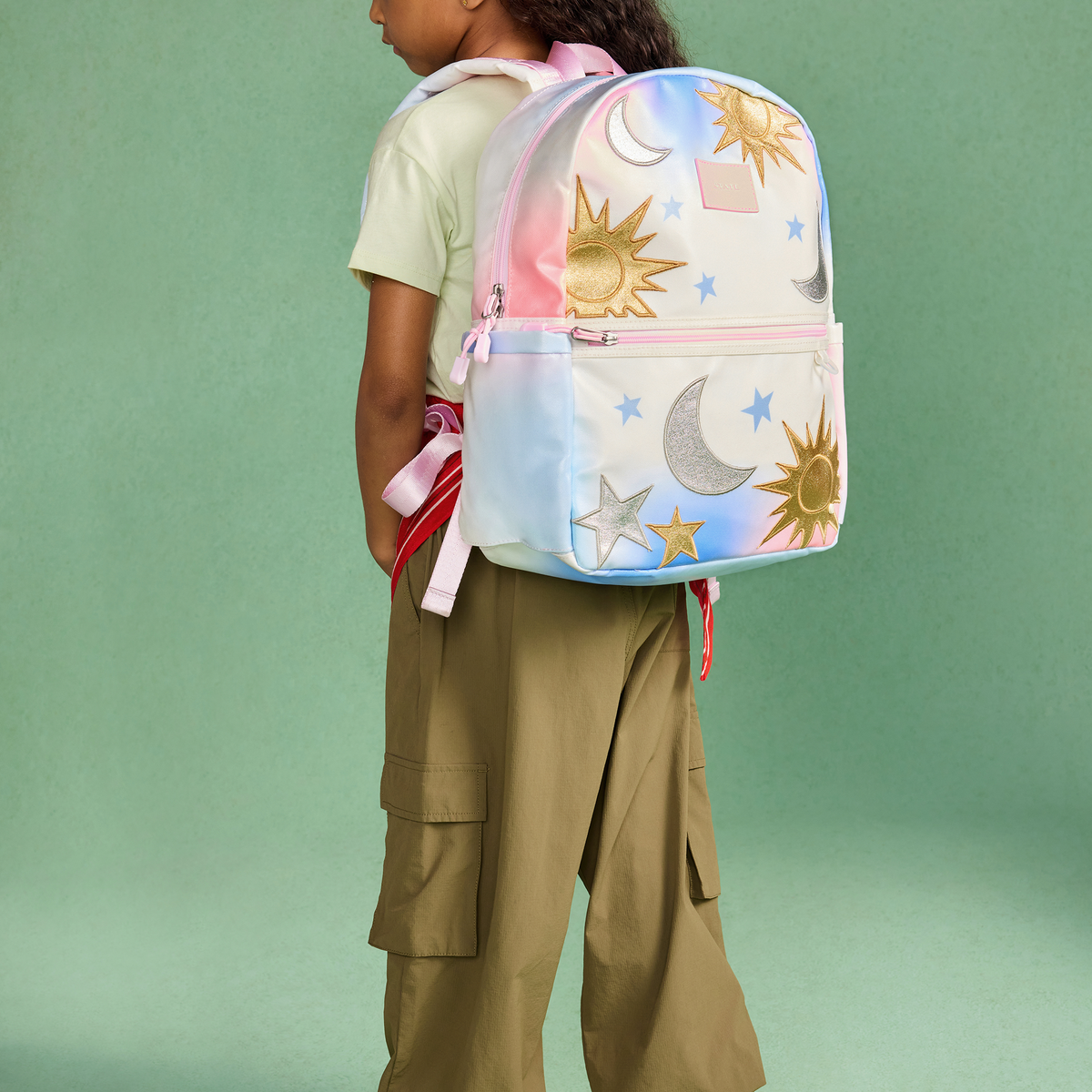 girl wearing Kane Backpack Celestial