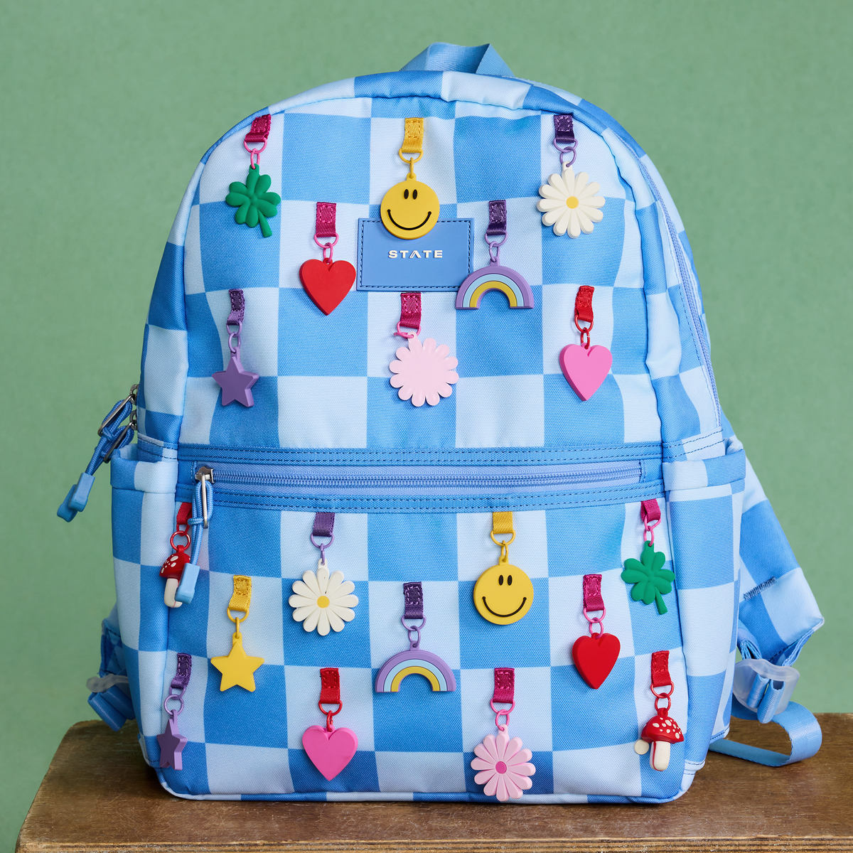 Kane Double Pocket Backpack charms blue checkerboard up close