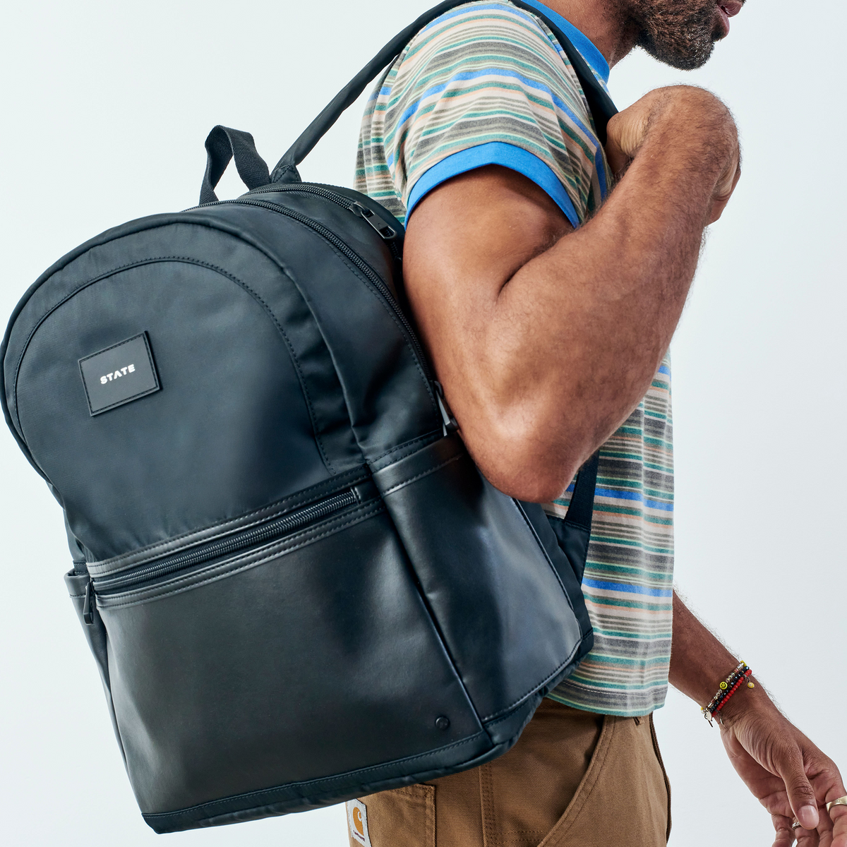 Man wearing STATE Bags Evan's Double Pocket Black