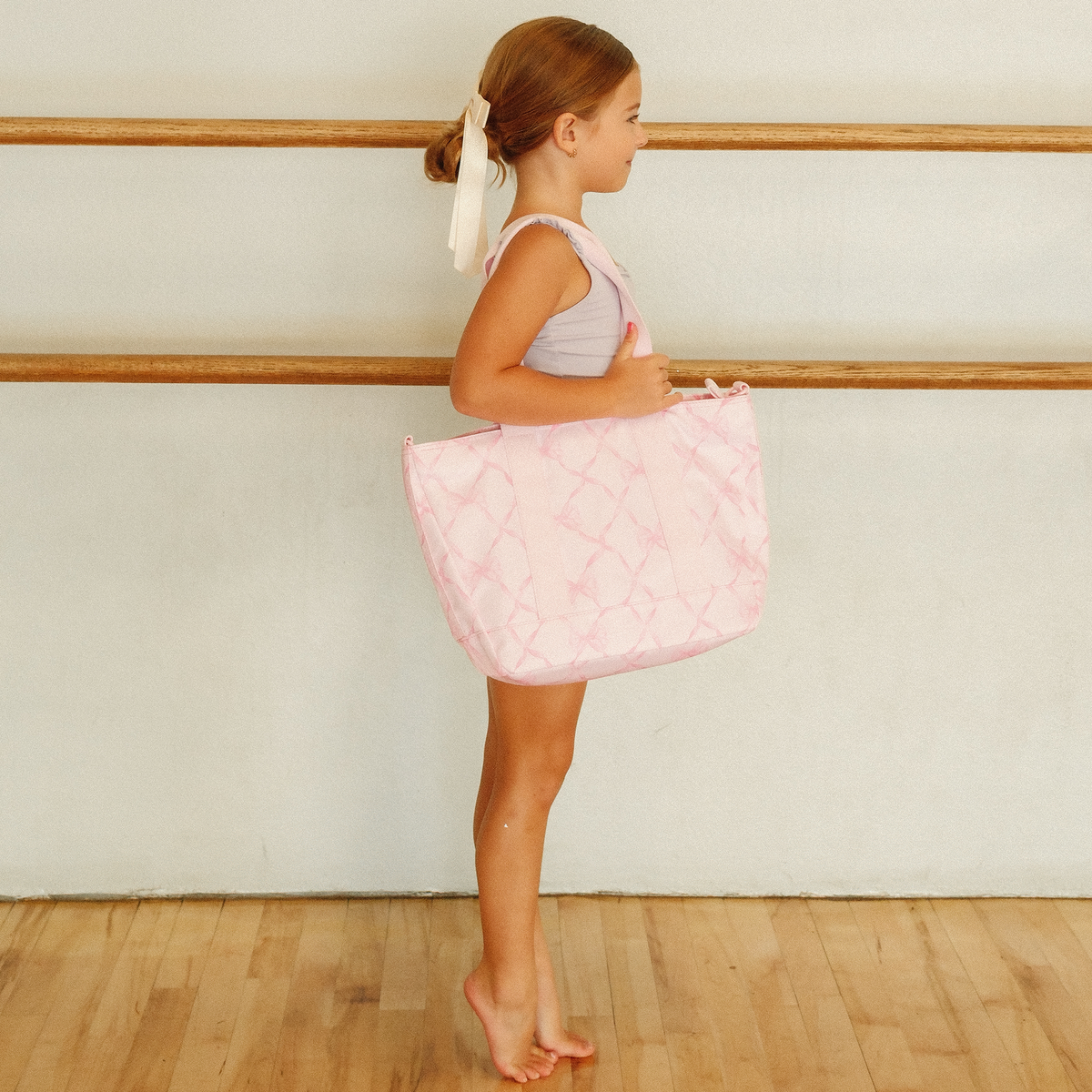 girl wearing STATE x LoveShack Fancy ballet Tote