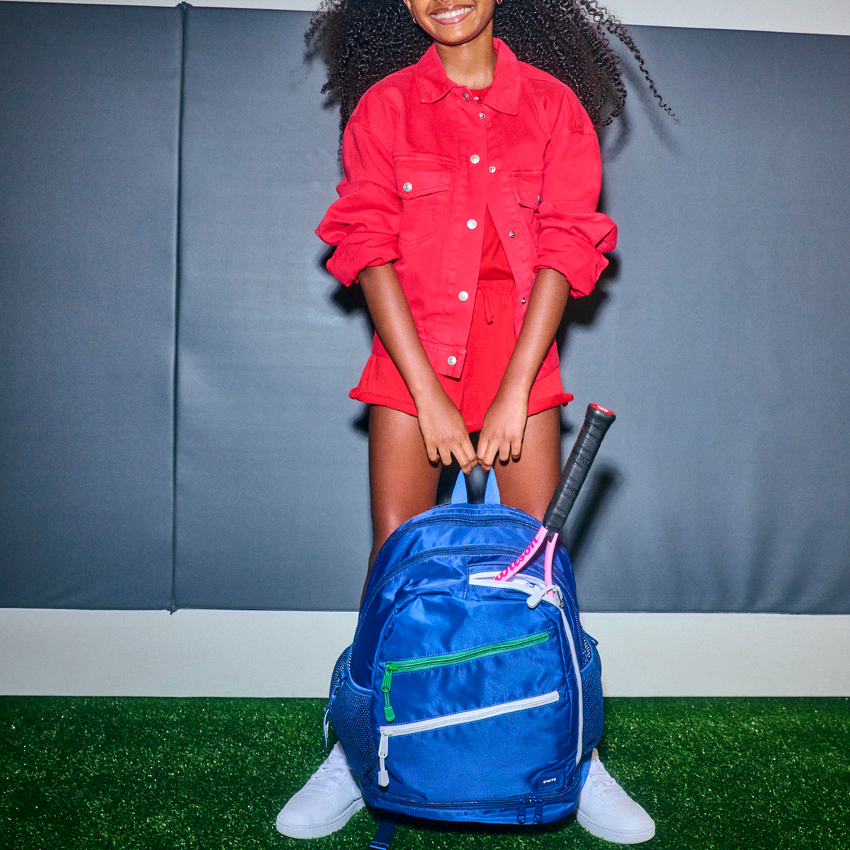 girl holding STATE Bags Lenox Tennis Bag Navy Click to Zoom