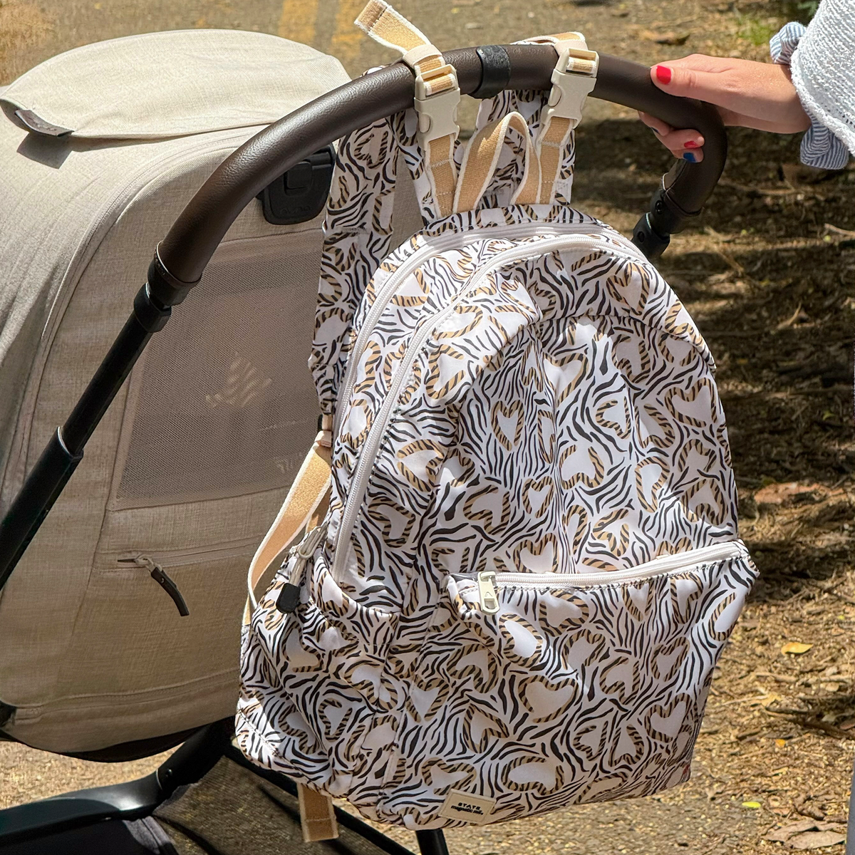 stroller with STATE x MagneticMe Lorimer Diaper Bag on