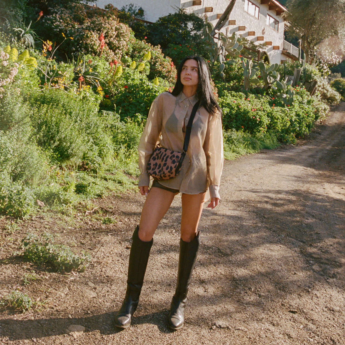 woman wearing STATE Bags Luna Mini Leopard