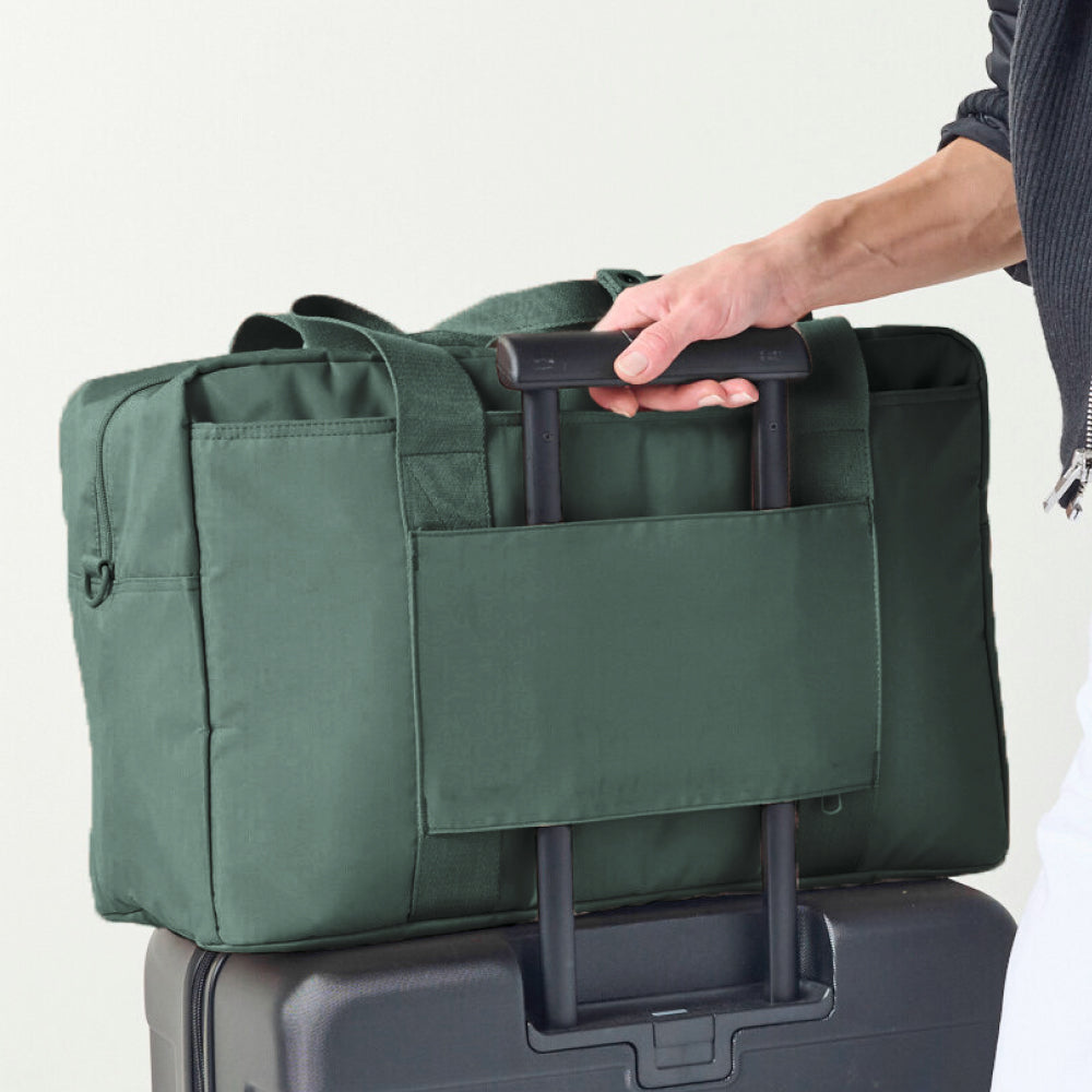 STATE Bags Wellington Weekender Olive on Suitcase using Luggage Sleeve