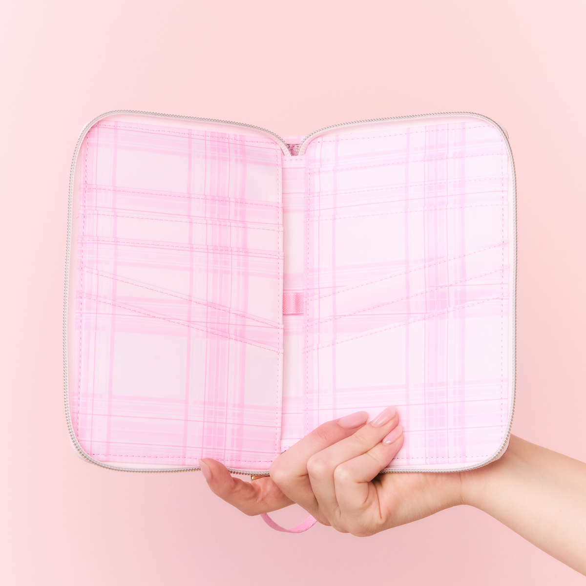 Woman holding STATE x LoveShackFancy Passport Holder Open Metallic Pink Vanilla 