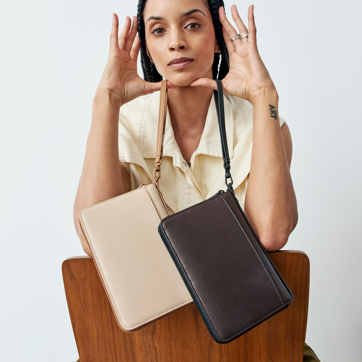 woman holding STATE Bags Passport Holders