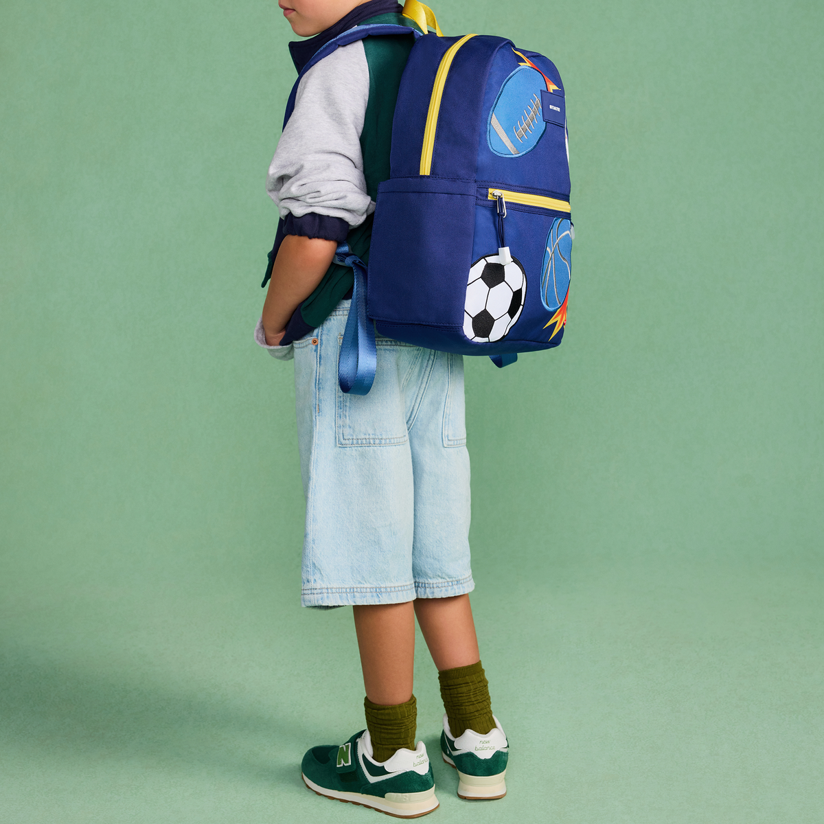 boy wearing STATE Bags Kane Backpack Patchwork sports