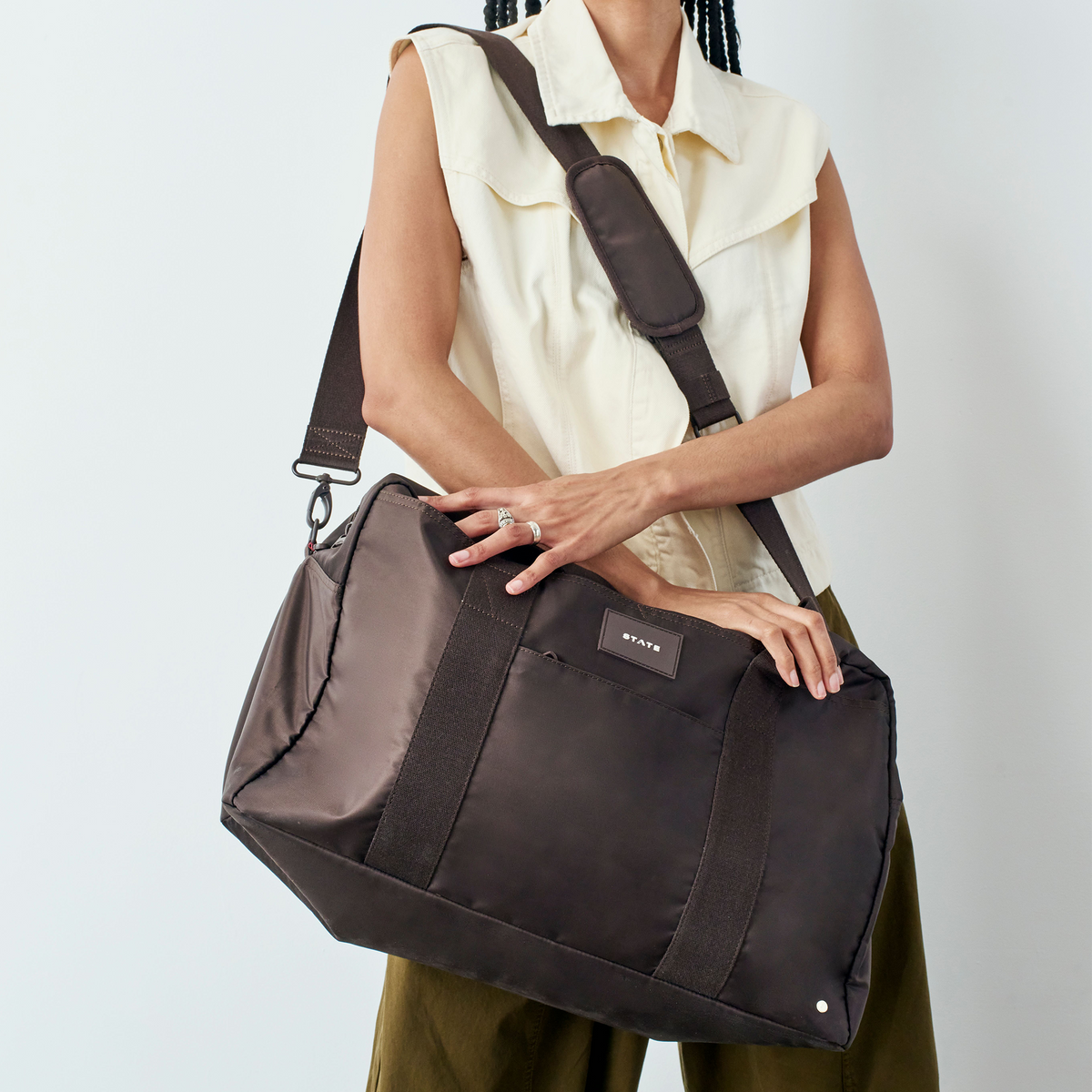 Woman wearing state bags wellington weekender brown